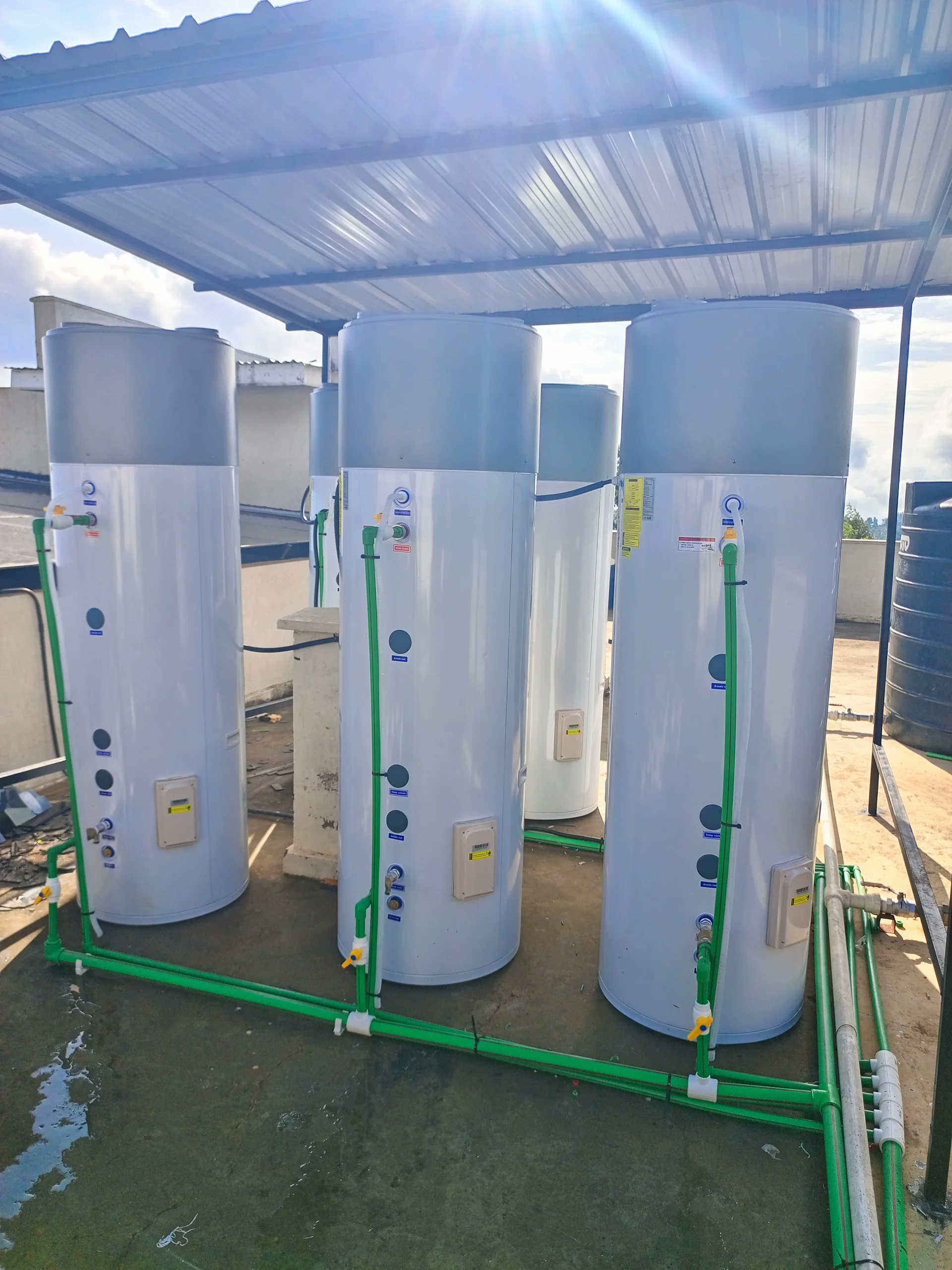 Modern outdoor heat pump unit installed beside a building